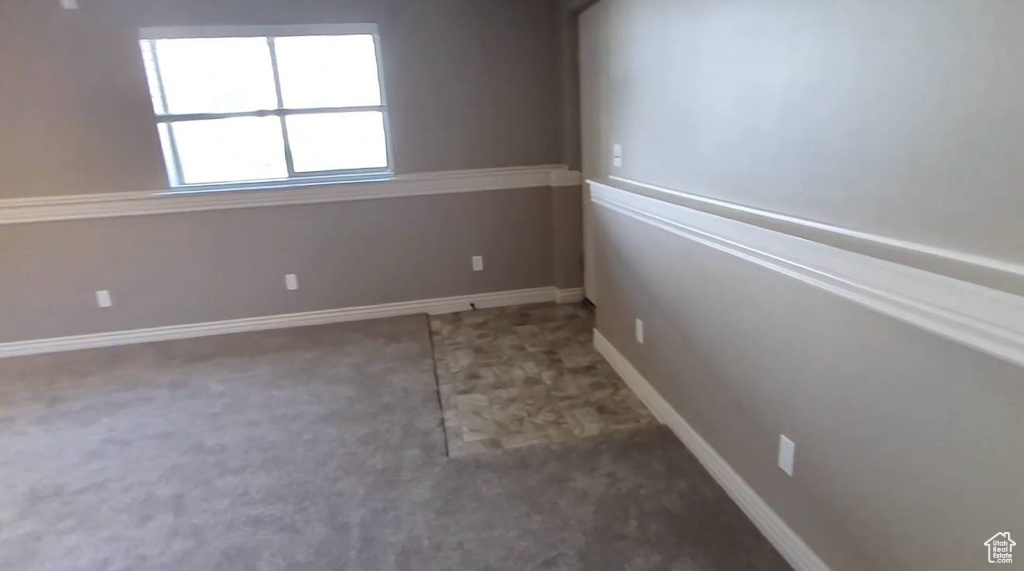 Empty room with baseboards
