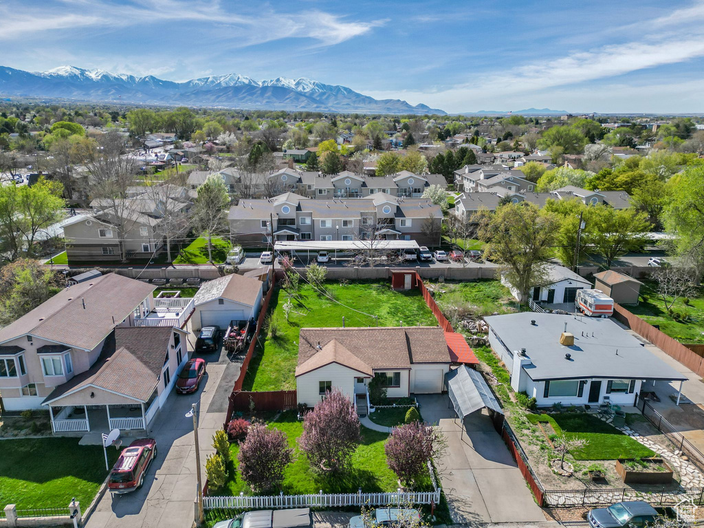 Drone / aerial view featuring a mountain view and a residential view