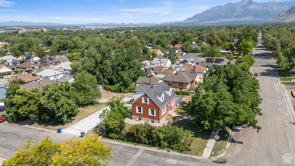 Aerial view of residential area with a mountain backdrop
