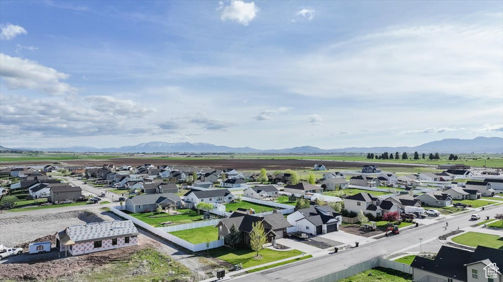Aerial view of residential area with a mountain backdrop