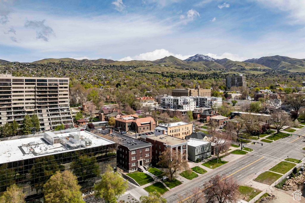 Birds eye view of property with a mountain view