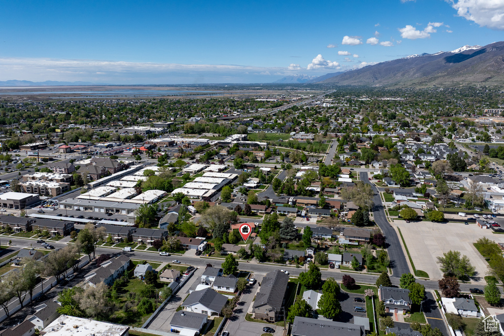 Drone / aerial view featuring a mountain view and a residential view