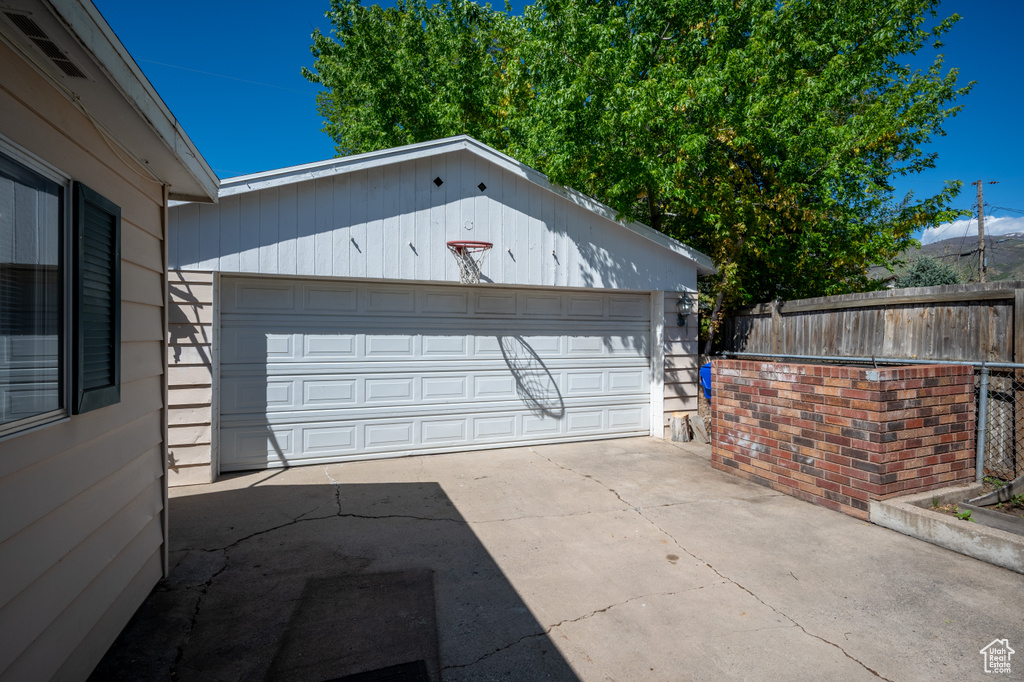 Detached garage with fence