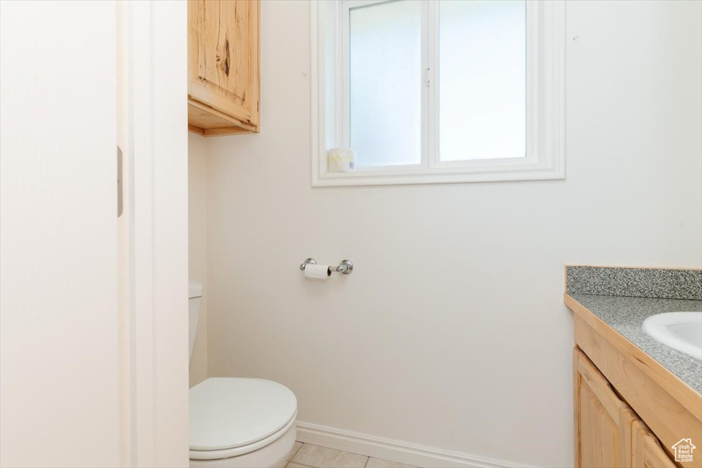 Bathroom featuring toilet and vanity