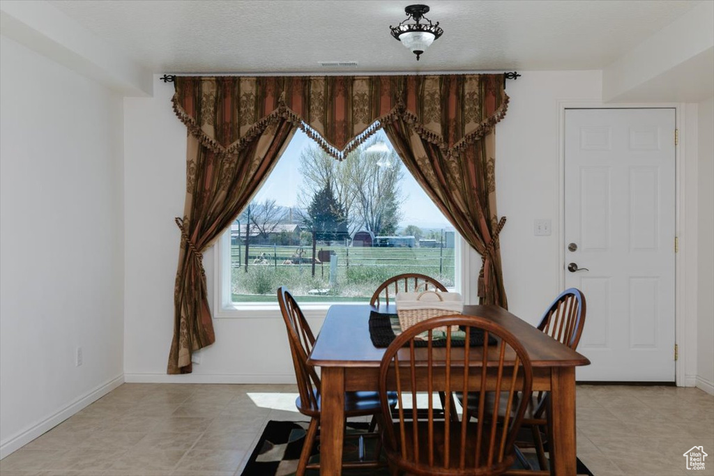 Dining space featuring baseboards