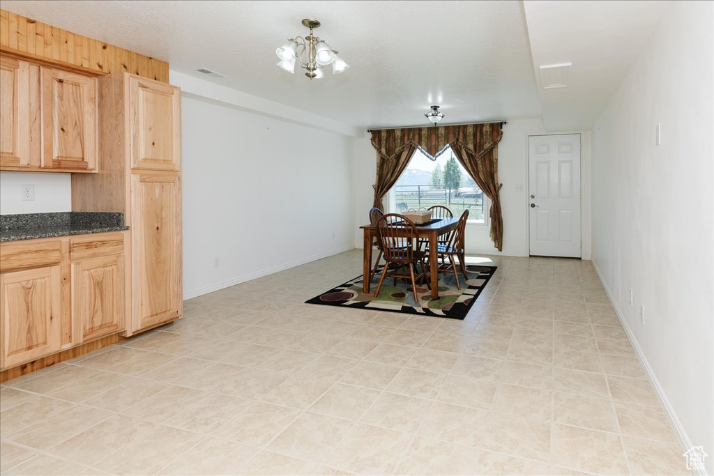 Dining space featuring a chandelier