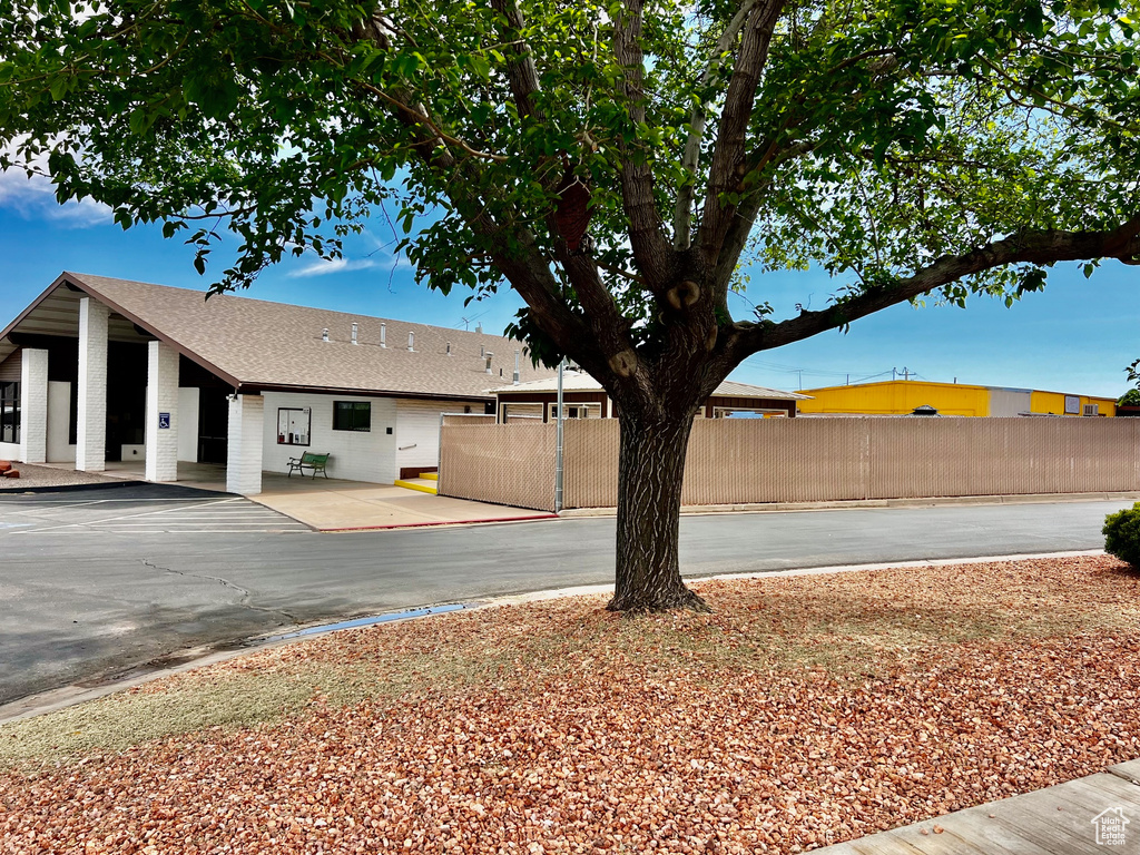 View of yard with a patio area and fence