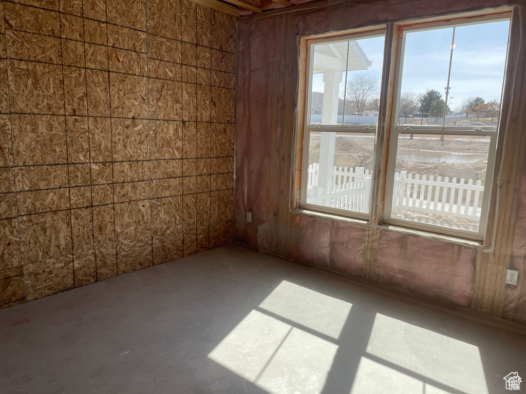 Spare room with concrete flooring