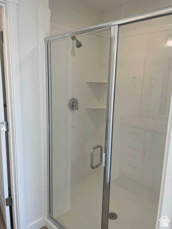 Bathroom featuring a shower stall