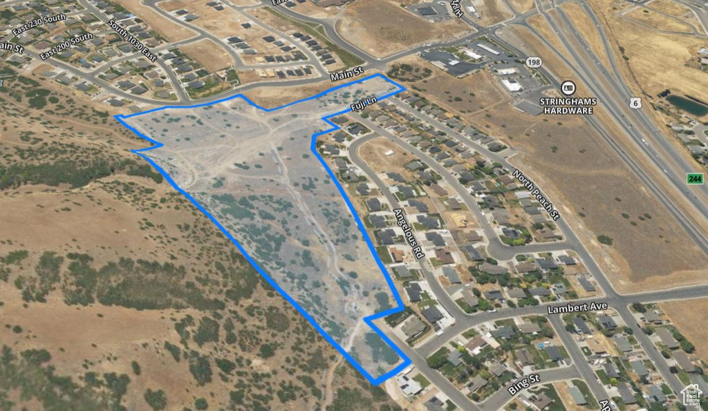 Aerial overview of property's location featuring property boundaries highlighted