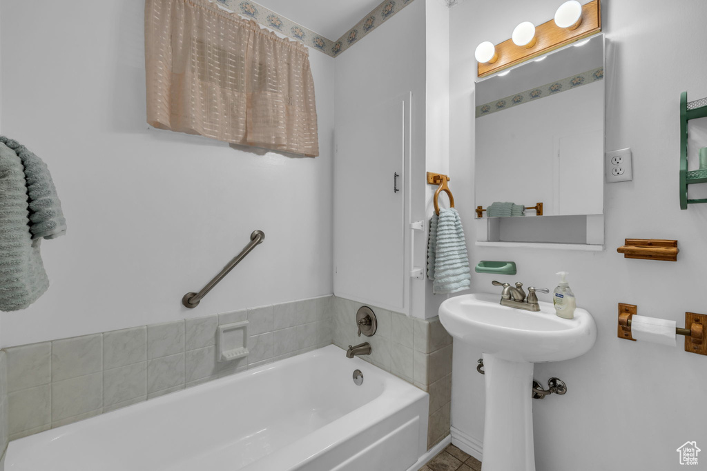 Full bathroom featuring a garden tub
