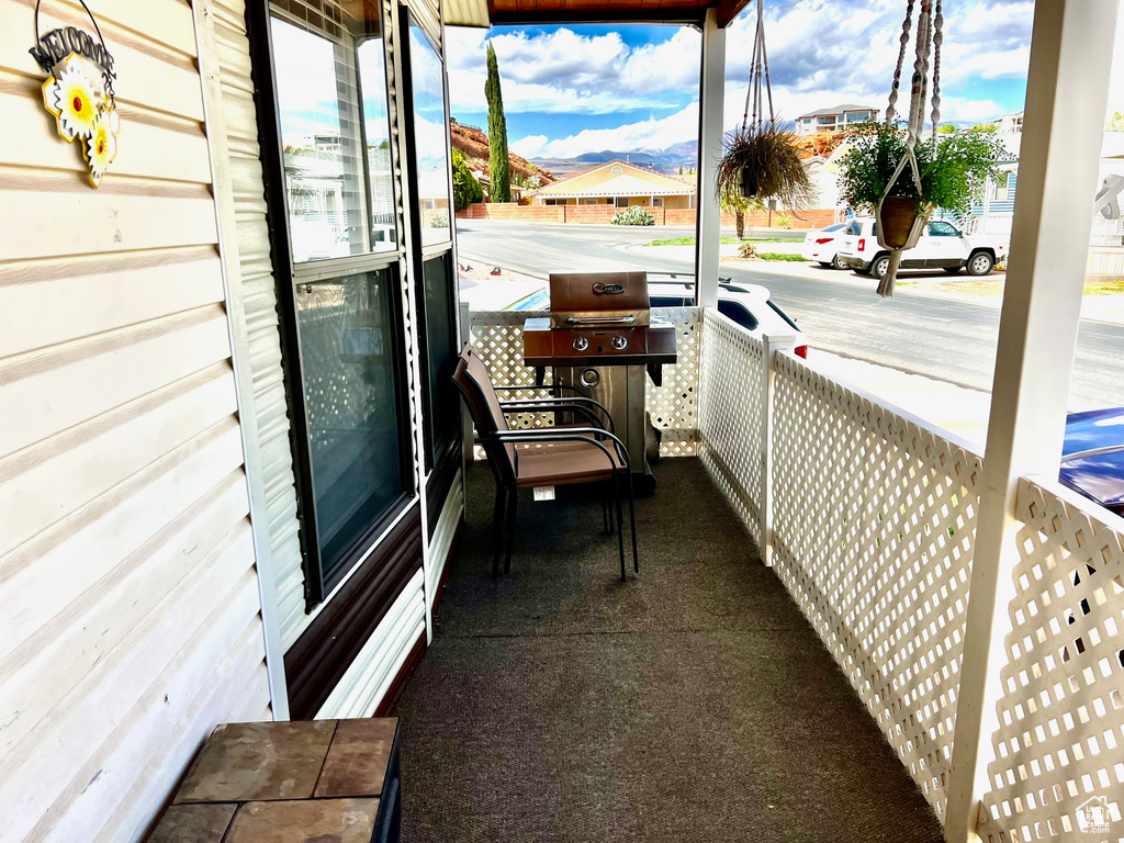 Balcony featuring a mountain view