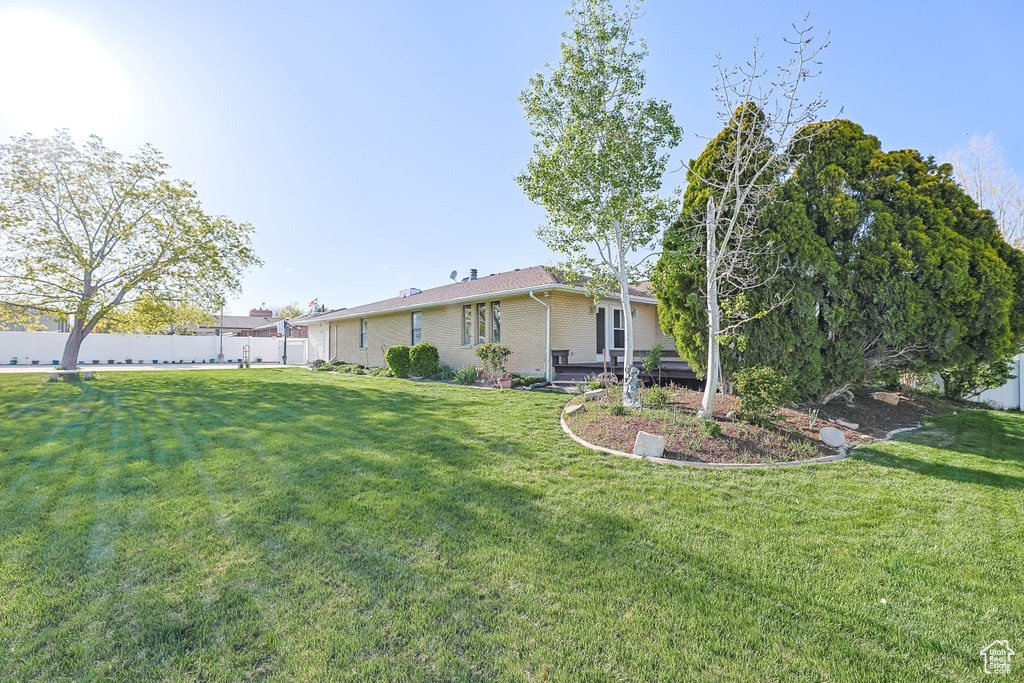 View of yard with fence