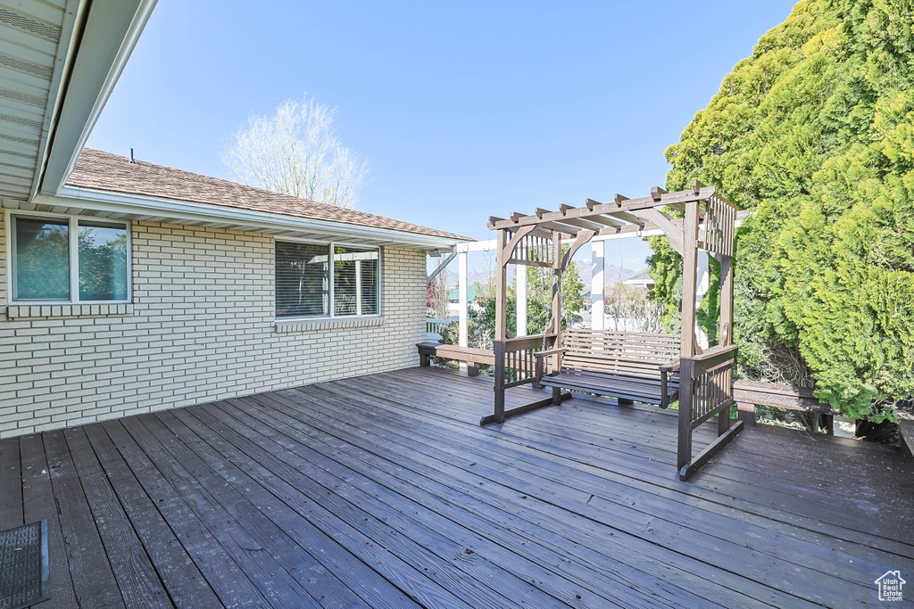 Wooden terrace with a pergola