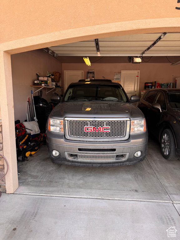 Garage featuring a garage door opener