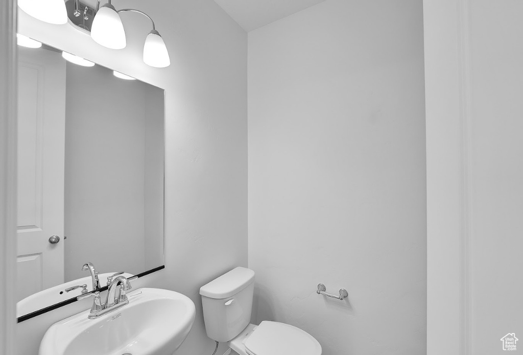Bathroom with a sink and toilet