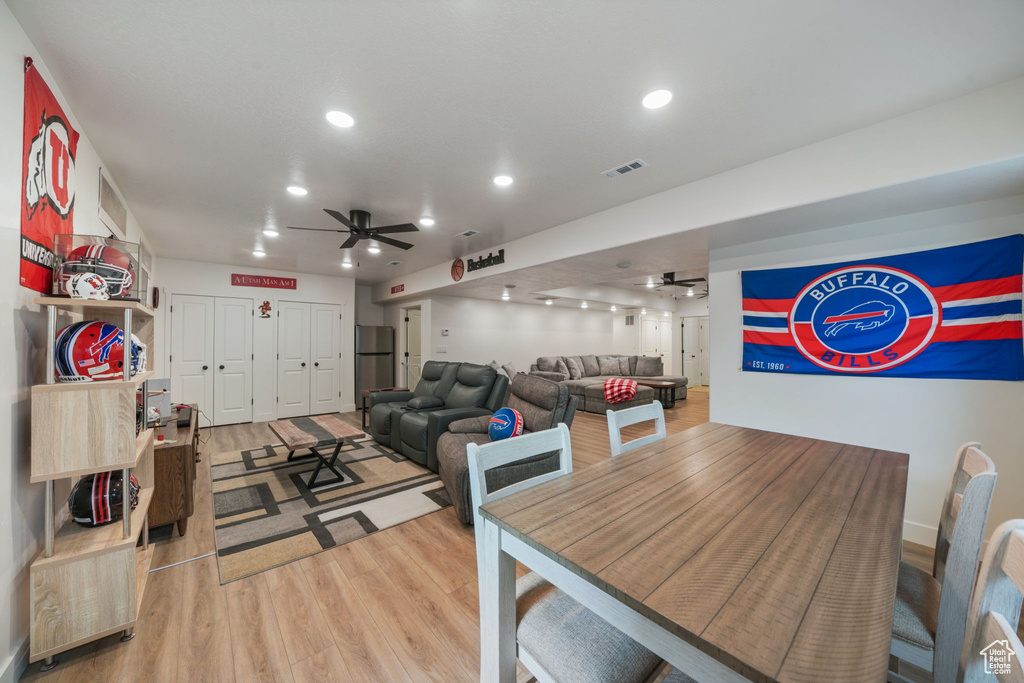 Dining space with recessed lighting, ceiling fan, visible vents, and light wood finished floors