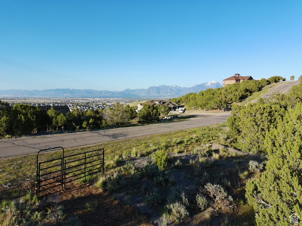 View of mountain backdrop with rural landscape