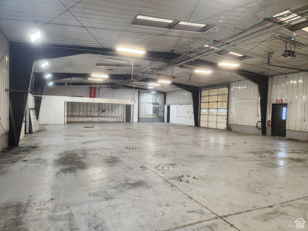 Garage featuring a garage door opener