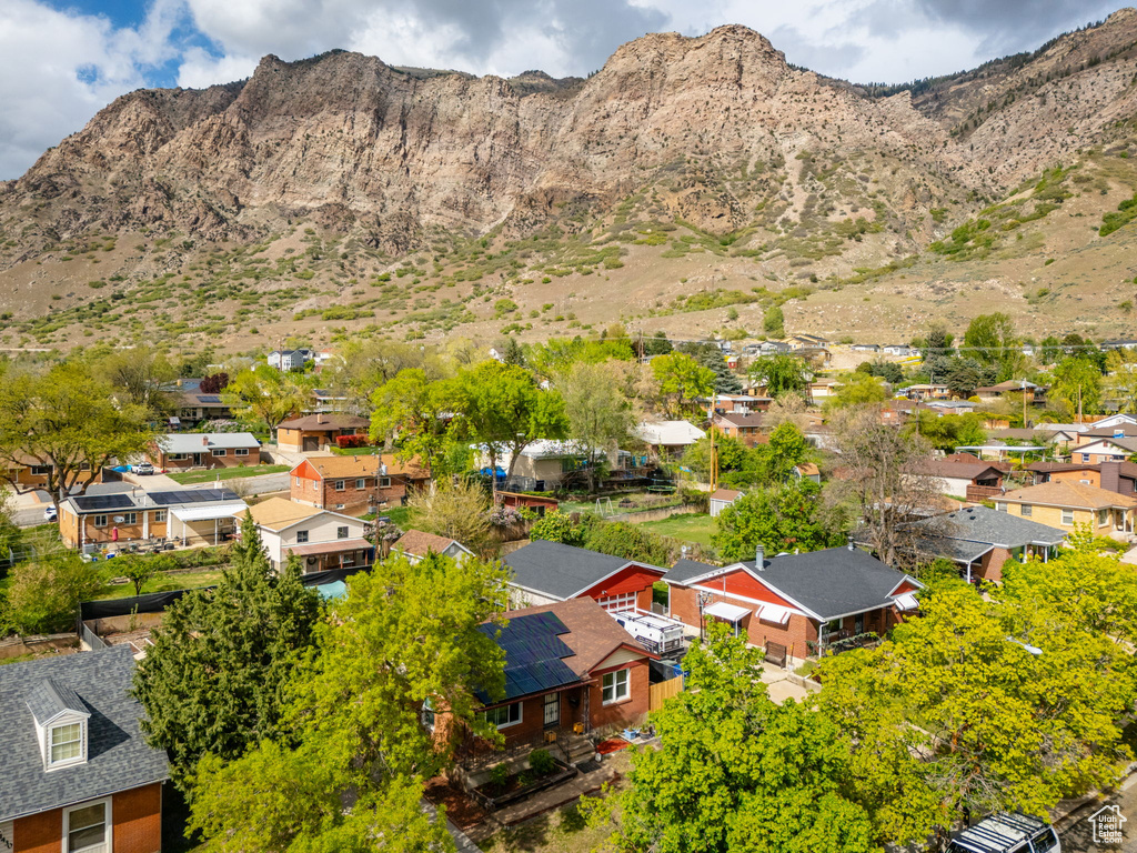 Drone / aerial view with a mountain view and a residential view