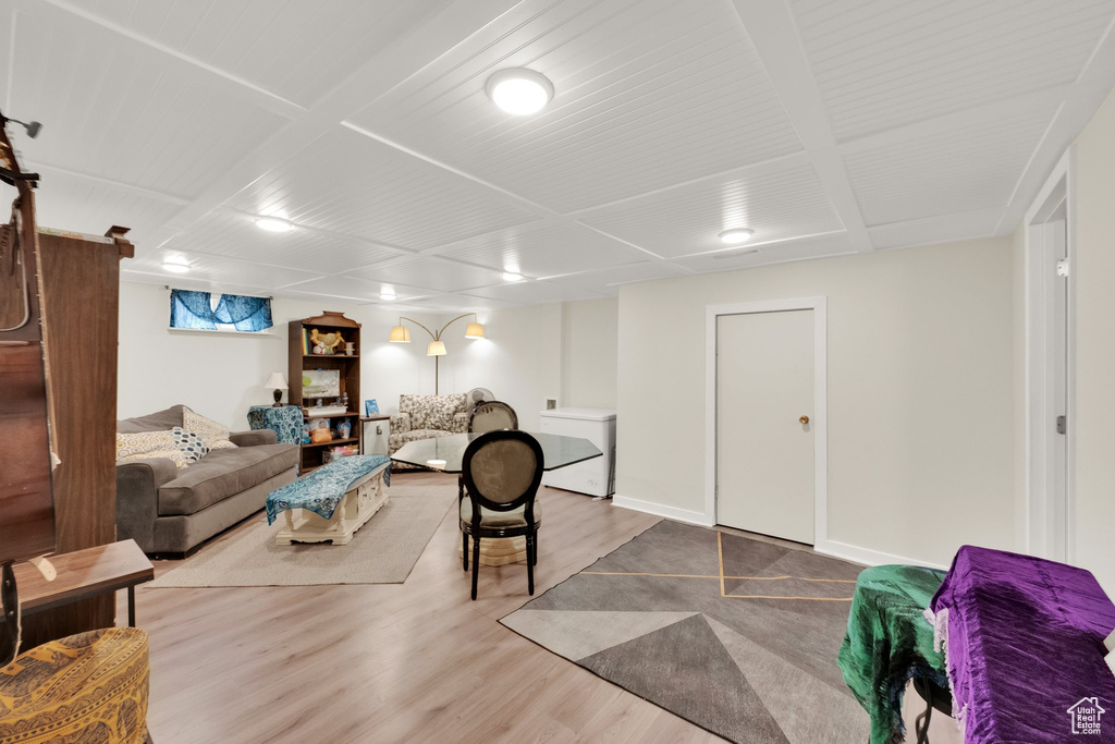 Living room with baseboards and wood finished floors