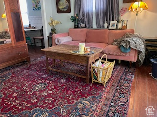 Living area with wood finished floors