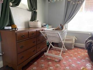 Bedroom with baseboards