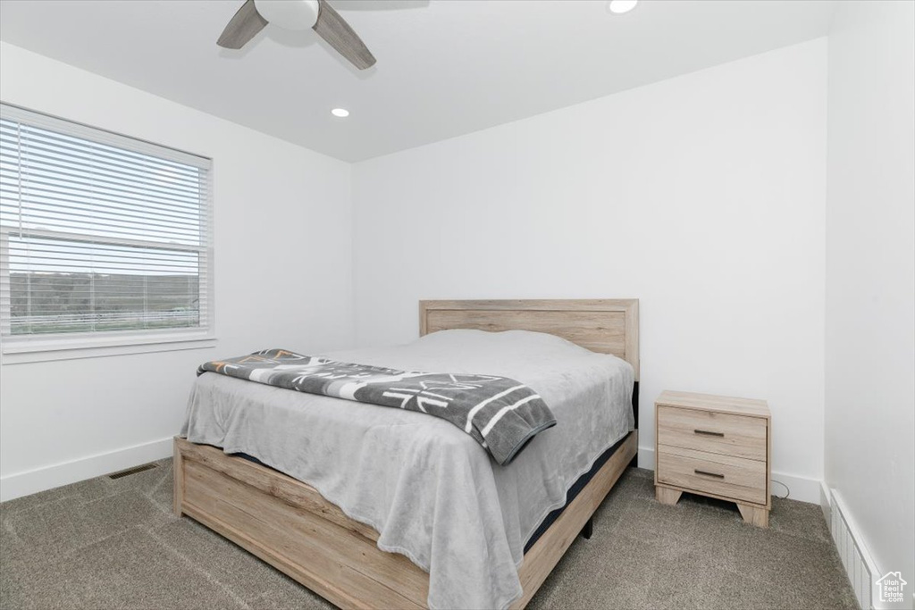 Bedroom featuring recessed lighting, carpet floors, visible vents, and baseboards