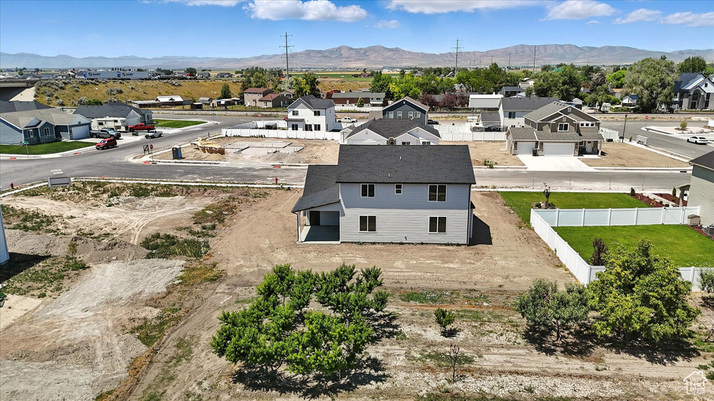 Aerial view of residential area with mountains