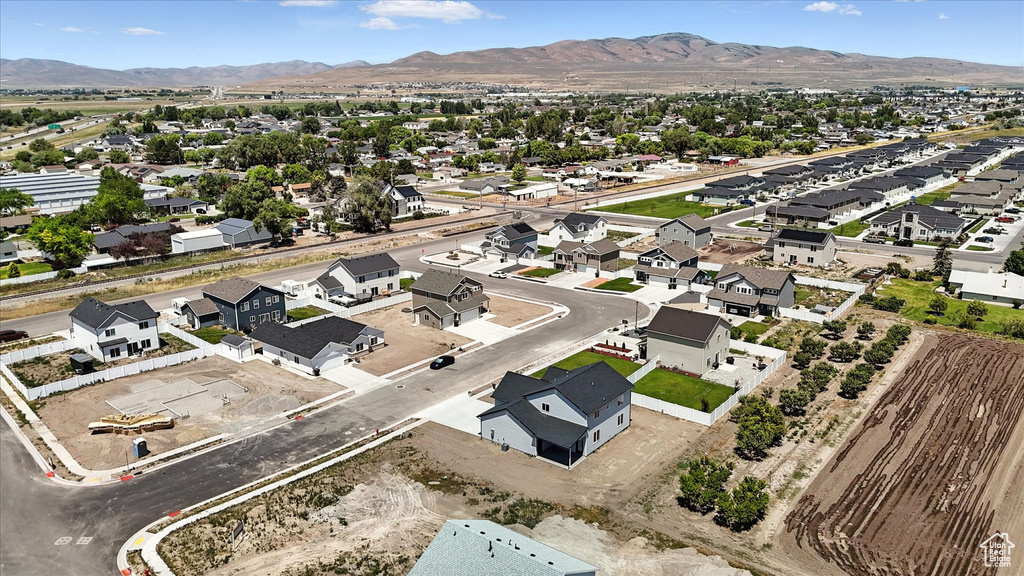 Aerial view of residential area with a mountain backdrop