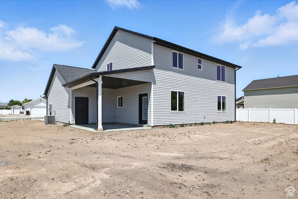 Back of property featuring a patio