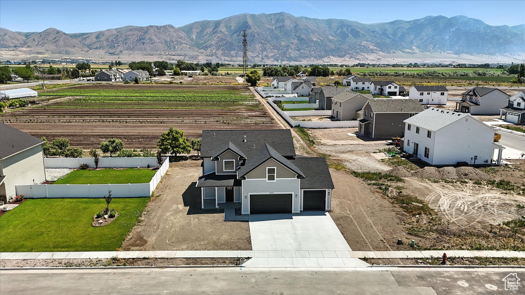View of mountain backdrop with nearby suburban area