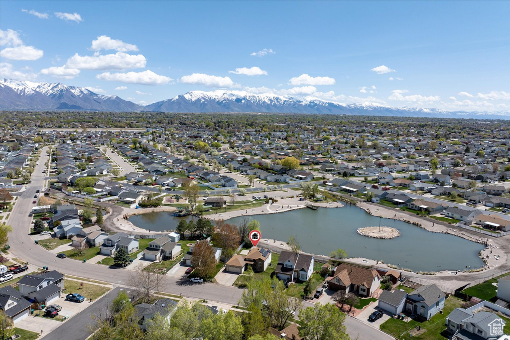 Bird's eye view featuring a water and mountain view and a residential view