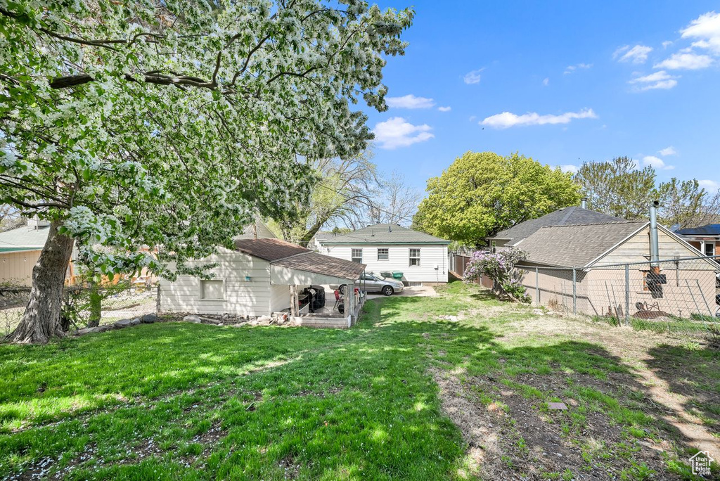 View of yard with fence