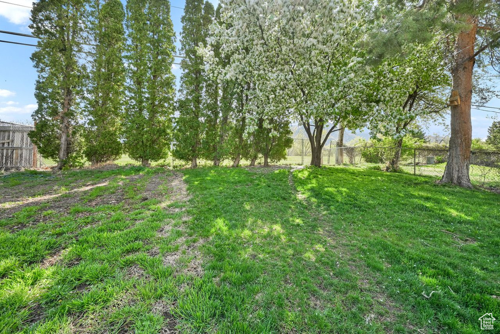 View of yard with fence