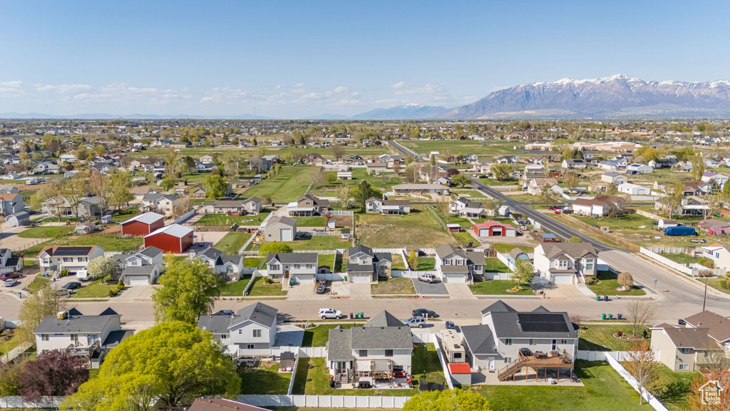 Birds eye view of property featuring a residential view and a mountain view