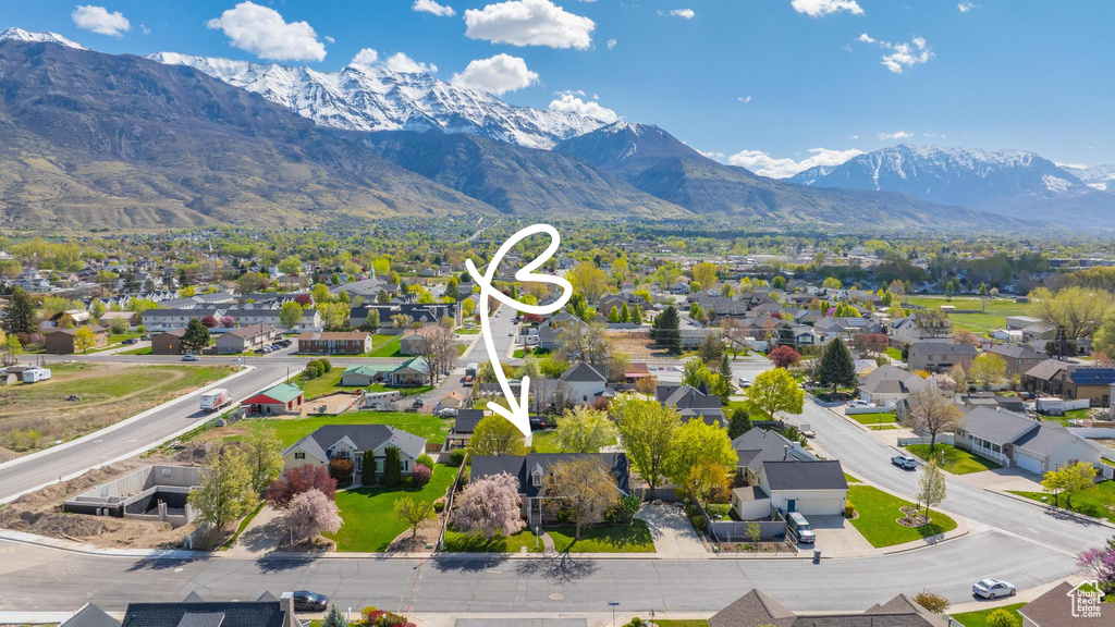 Aerial view featuring a residential view and a mountain view