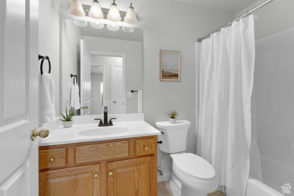 Bathroom with vanity and toilet