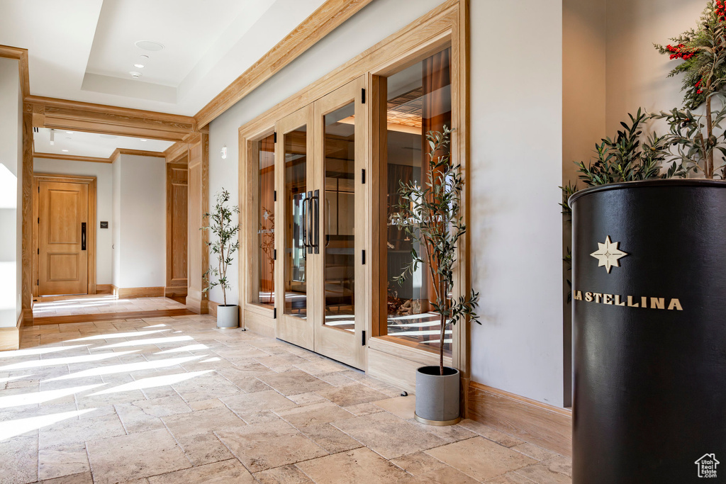 Interior space featuring stone tile flooring and baseboards