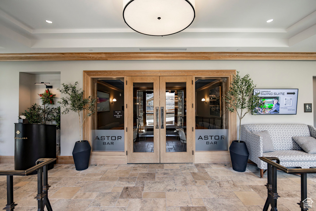 Doorway to property featuring french doors