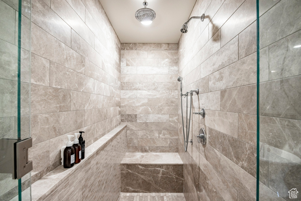 Full bath with tiled shower