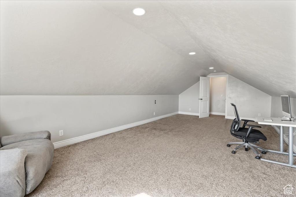 Office featuring recessed lighting, baseboards, vaulted ceiling, and carpet