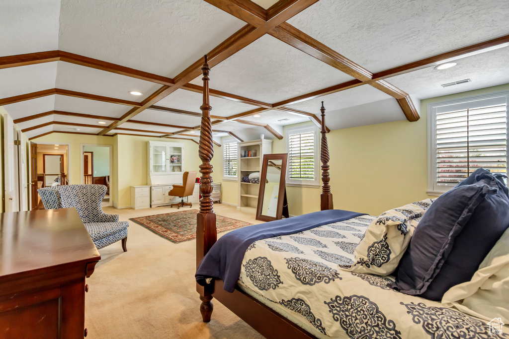 Carpeted bedroom with visible vents, recessed lighting, a textured ceiling, and coffered ceiling