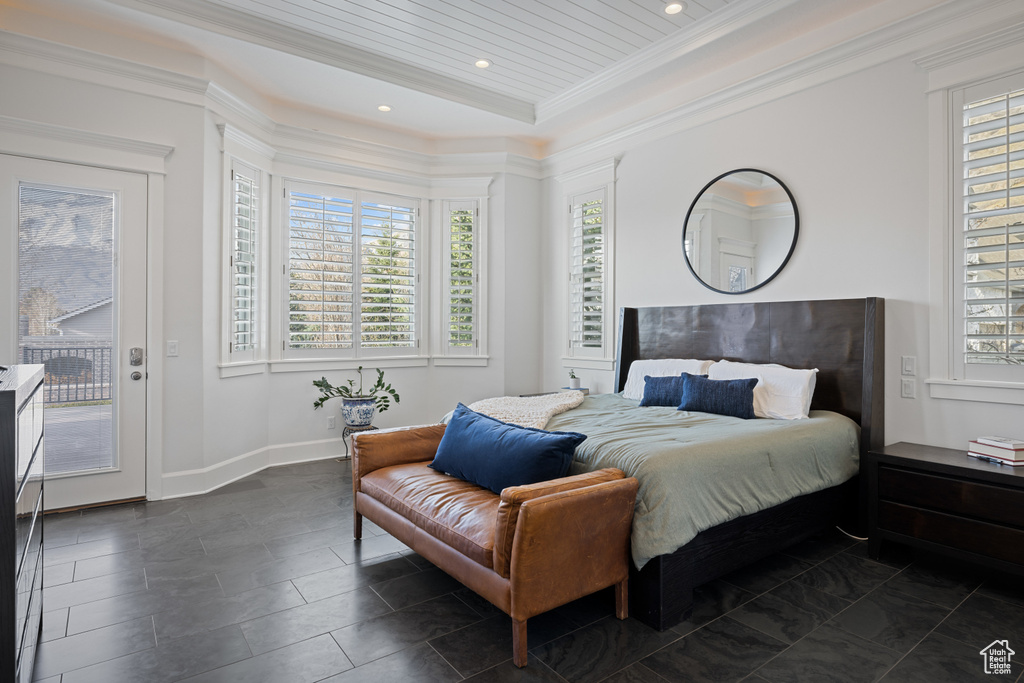 Bedroom featuring crown molding, access to outside, recessed lighting, and multiple windows