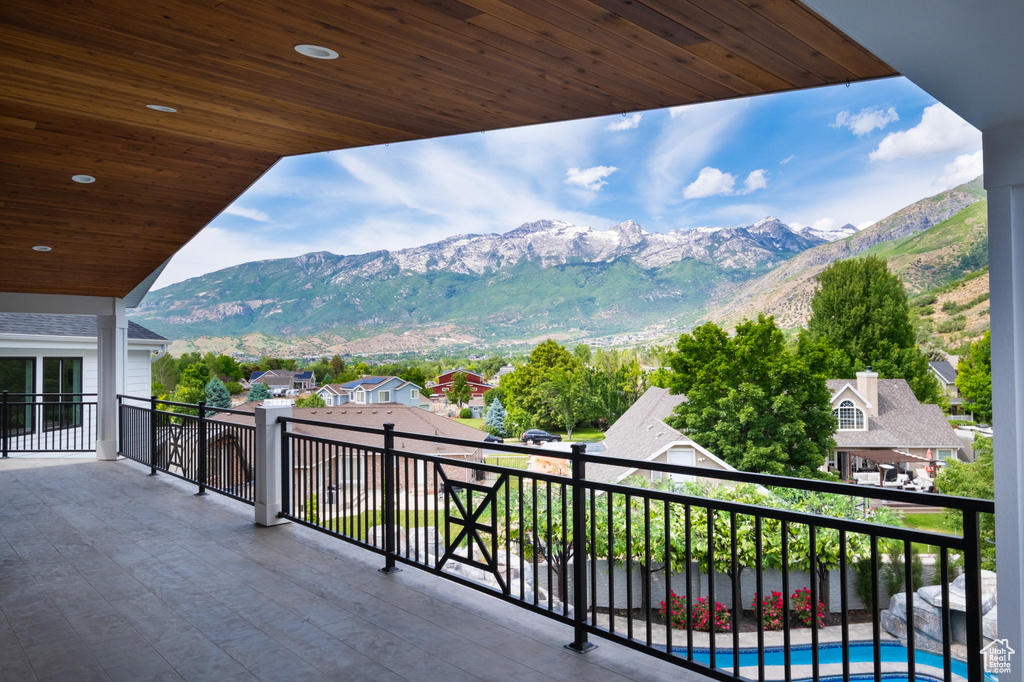 Balcony with a mountain view and a residential view