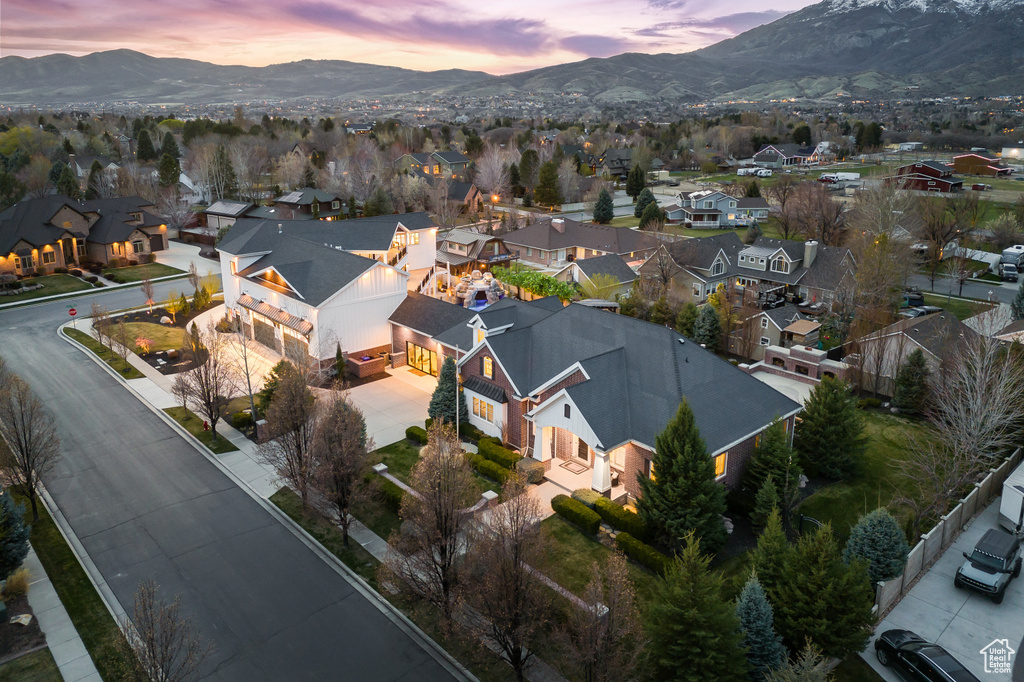 Drone / aerial view with a mountain view and a residential view
