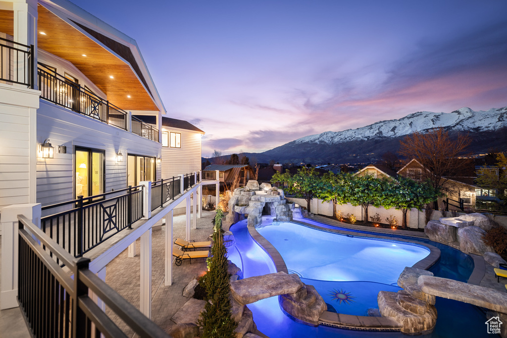 View of pool featuring a fenced in pool and a mountain view