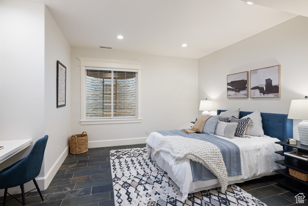 Bedroom with recessed lighting, visible vents, and baseboards