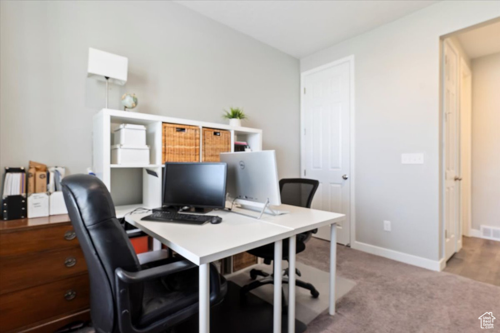 Office featuring visible vents, carpet flooring, and baseboards
