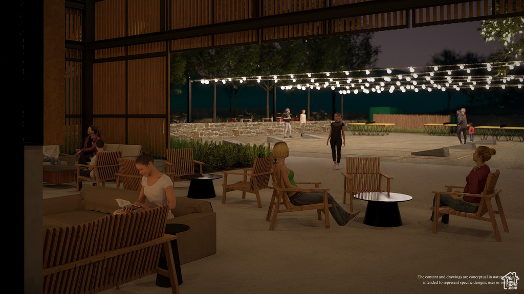 Patio at twilight with an outdoor living space with a fire pit
